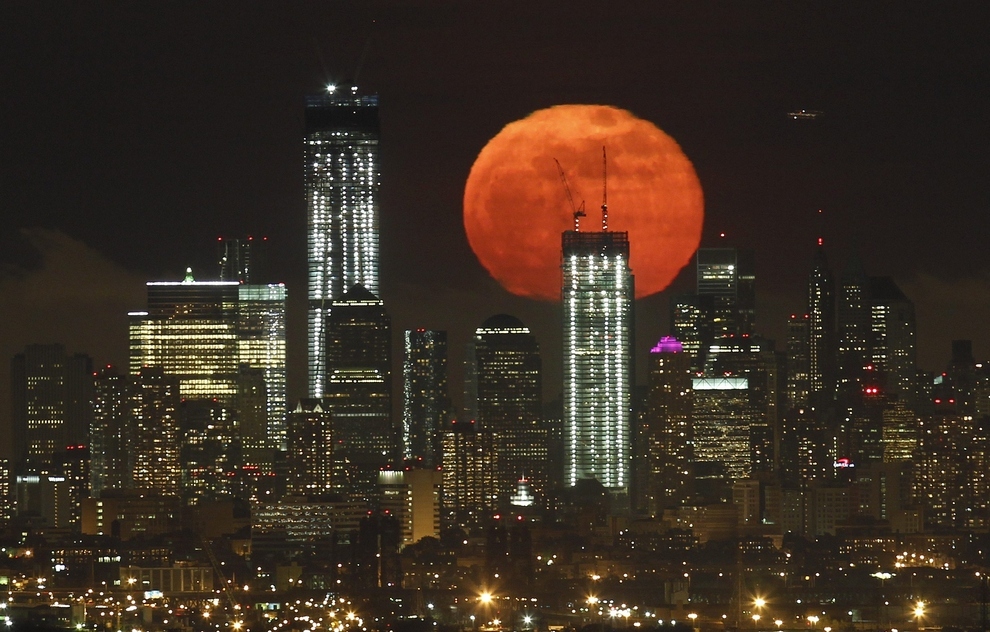 Memorial Freedom Tower Rising from Ground Zero Against a Supermoon in 2012