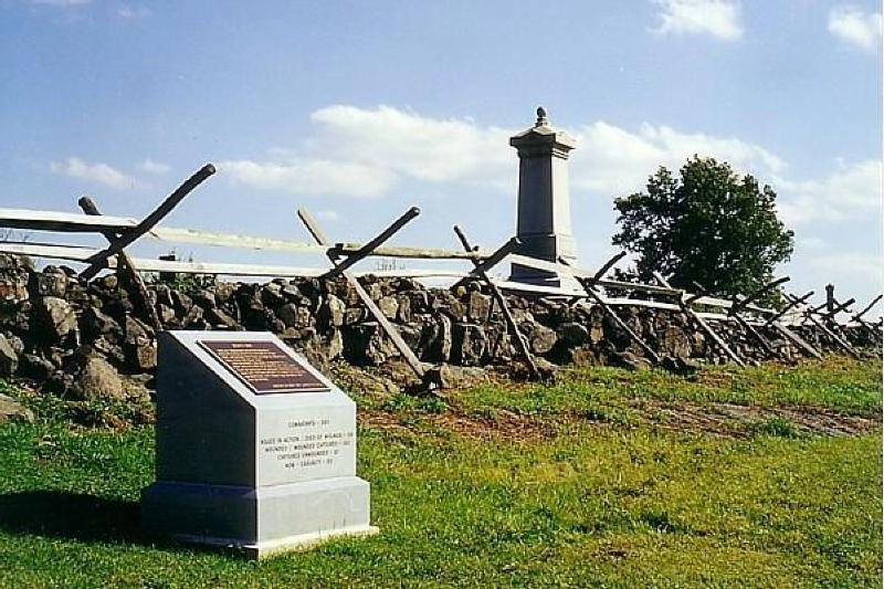 Stone wall on Cemetery Ridge divides Union and Confederate Monuments